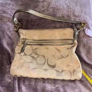 Beige canvas monogram Coach purse